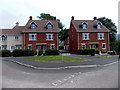 Recently-built houses in Byes Lane Sidford