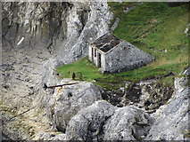 D0843 : Derelict building by the cliffs on Kinbane Head by Gareth James