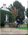 SK6142 : Gedling: tending the flowers at the miners' memorial by John Sutton