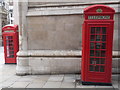 TQ3181 : London: K2 phone boxes on Bell Yard corner by Chris Downer