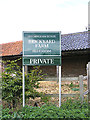 TM3093 : Brickyard Farm sign by Geographer