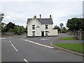 Station Road passes The Lodge