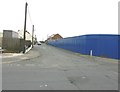 Blue hoarding along First Avenue