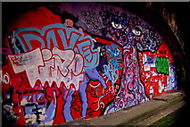 J3473 : Belfast City Centre- Colourful Graffiti under East Bridge Street by Joseph Mischyshyn
