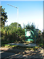 Green box guarding manholes in Broad Lane