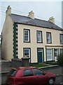 Former shop and adjoining house on Harbour Road, Carnlough