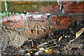 Benchmark on railway bridge on Sandy Lane