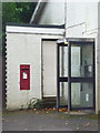 Burley Street: postbox № BH24 12 and phone