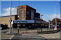 TA0529 : Shops at Calvert Lane roundabout, Hull by Ian S
