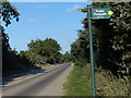 Public footpath sign along West Lane