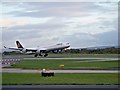 SJ8184 : Airbus A340 Taking Off at Manchester Airport by David Dixon