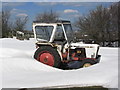 SK2156 : Old tractor in snow, Gallowlow Lane near Longcliffe by Colin Park