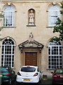 Statues over the doorway of the Blue School