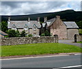 Grade II listed number 5 Pont-y-Bryn Hurt and former wash house NW of Crickhowell