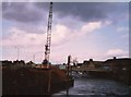 TF4609 : Crane on the bank of The River Nene, Wisbech - 1985 by Richard Humphrey