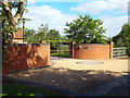 Paved turn-in, house gates and flank walls, Ashford Lane