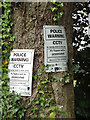 Police Warning notices on a tree, Sadlerswell Lane