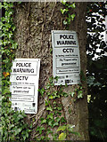SP1472 : Police Warning notices on a tree, Sadlerswell Lane by Robin Stott
