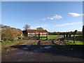 TM2892 : Footpath & entrance to Stag Farm Barn by Geographer