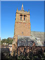 NY5261 : The tower and churchyard of St. Martin's Church by Mike Quinn