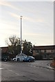 Flag pole and signpost