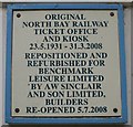 Plaque on miniature railway kiosk