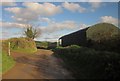 SX7767 : Barns at Gullaford by Derek Harper