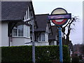 Sign on Heathfield Gardens at the rear entrance to Brent Cross station