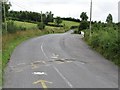 H6011 : Deadly potholes in the L2029 just south of Scarvy Bridge by Eric Jones