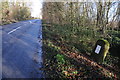 Milestone beside the B4211