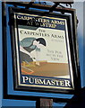 Name sign outside The Carpenters Arms at Westrip