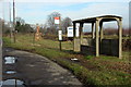 Bus stop and protest post by the Bedford Road