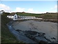 Double-decker beach huts and the beach, Porth Gwidden