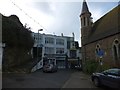 Large windows above Miller & Son, Estate Agents