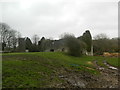 Ruins of Llantrithyd Place, with the tower of St Illtyd