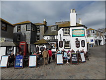 SW5140 : St. Ives: the Sloop Inn and a red phone box by Chris Downer