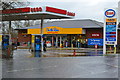 Flooded petrol filling station forecourt