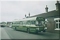 A Leyland National bus outside Great Missenden Station