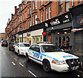 New York Police Department car on Dumbarton Road