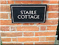 TM4489 : Stable Cottage sign by Geographer