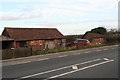 Sheds by Mill Row on the A16