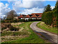 Lane approaches Bower Farm from the south