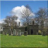 TL3746 : Meldreth churchyard in early March by John Sutton