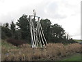 A modernistic representation of St Patrick overlooking the Belfast Road