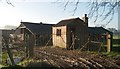 Derelict factory gatehouse building at Peaton Hall