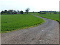 Track across farmland to Ironstone Lodge