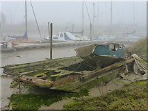 TR0062 : Wreck of a boat, Oare Creek in the mist by pam fray