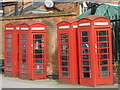 Four red telephone boxes, Chapel Street Gardens / Church Street, EN2