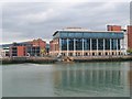 The Aepona UK Head Office and the entrance gate to Clarendon Dock