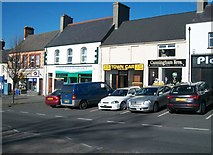 J3436 : Shops on the north side of Castlewellan's Main Street by Eric Jones